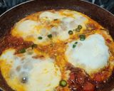 A picture of step 6 of KHAGINA (a savoury egg dish).