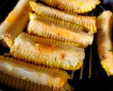 A picture of step 3 of Butter Garlicky Spicy Grilled Crispy Curly Corn Ribs - With Schezwan Dip Corn Ribs Monsoon Munching.