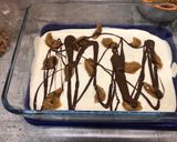 A picture of step 7 of Vanilla bean ice cream with ginger biscuits, caramel and chocolate.