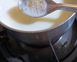 A picture of step 4 of Broken Wheat Kheer with pumpkin seeds.