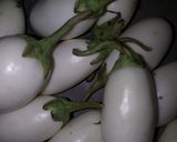 A picture of step 1 of Stuffed white eggplants.