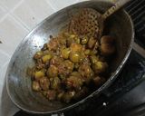 A picture of step 5 of Kundru Peanut masala with Chapati Daal and salad.
