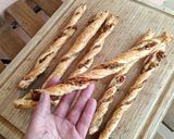 Foto del paso 7 de la receta Lazo de hojaldre de tomate seco, aceitunas y mostaza