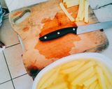A picture of step 2 of Home made French Fries.