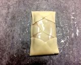 A picture of step 5 of Easy Burritos with Gyoza Wrappers (Toaster Method).