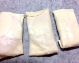 A picture of step 6 of Easy Burritos with Gyoza Wrappers (Toaster Method).