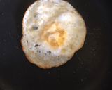 A picture of step 1 of Cheesy egg toast.