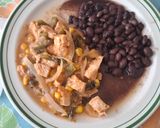 Foto del paso 5 de la receta: Pechugas con rajas y elote en caldillo de jitomate