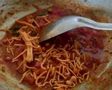 A picture of step 4 of Sev Tomato Sabji - Gujarati dinner sabji with butter roti.