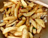 A picture of step 5 of MY Chilli Salt & Pepper Chips on a Baguette 😍.