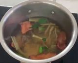 A picture of step 2 of Tom Yum Head Salmon’s Clear Soup.