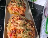 A picture of step 6 of Stuffed Zucchini Gratin in a Dutch Oven.