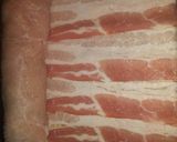 Sajtal sonkával töltött karaj baconbe tekerve recept fázis 3 fotója