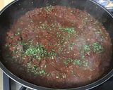 Une image de l'étape 17 de Dahl de lentilles jaunes aux carottes violettes, tomates et courgette.