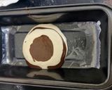 A picture of step 5 of Zebra Cake.
