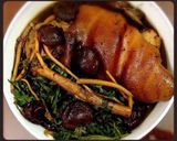 A picture of step 6 of Braised Pork Trotters with Chinese Herbs and Mugwort.