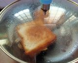 A picture of step 2 of Eggs sandwich.