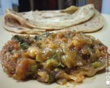 A picture of step 4 of Laccha parantha with bharta.
