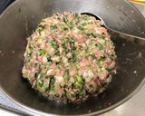 A picture of step 5 of Juicy Pan-Fried Dumplings with Napa Cabbage and Garlic Chives.