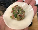 A picture of step 8 of Juicy Pan-Fried Dumplings with Napa Cabbage and Garlic Chives.