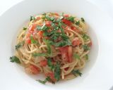 Une image de l'étape 5 de Spaghetti aux tomates, anchois et coriandre..