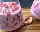 A picture of step 3 of Watermelon ice with milk and grenadine syrup.