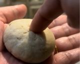 A picture of step 15 of Dal Bafla Baati Churma.