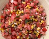 A picture of step 2 of Tomato Salad with Corn, Feta, and Mint.