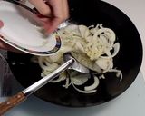 A picture of step 8 of Stir-Fried Pork with Onions.