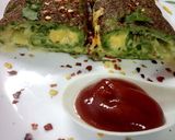 A picture of step 5 of Palak omelette cheese role.