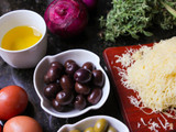 Pan de aceitunas, cebolla y provolone