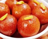 A picture of step 8 of Bread Gulab jamun.