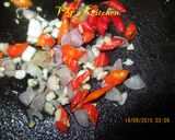 A picture of step 1 of Salted Fish Fried Rice (NASI GORENG IKAN ASIN).