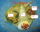 A picture of step 10 of Pupuan Rice Cakes (ENTIL PUPUAN).