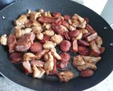 A picture of step 3 of Paella Valenciana.