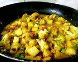 A picture of step 1 of Cauliflower Potato Peas Dry Vegetable or Sabzi.