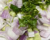A picture of step 1 of Cucumber onion raita.