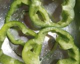 A picture of step 1 of Egg Capsicum Rings.