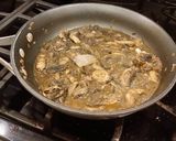 A picture of step 6 of Chicken Schnitzel with a Creamy Mushroom Sauce.