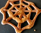 A picture of step 3 of Halloween Spiders And Chocolate Vanilla Eggless Spiderweb Pancake.