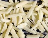 A picture of step 3 of Peri Peri French fries.