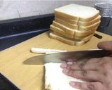 A picture of step 2 of Egg-cheese salad in bread cups.