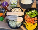 A picture of step 1 of One Pot Steamed White Fish and Savory Rice with Roasted Garlic and Tomato Sauce.