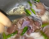A picture of step 3 of Shaljam Palak Gosht.