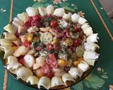 Une image de l'étape 11 de Salade de pommes de terre aux tomates, poivrons, artichauts et olives.