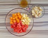 A picture of step 1 of Simple Fruit Salad with Honey Lime Dressing.