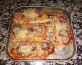 Foto del paso 5 de la receta: Pechugas de pollo estilo pizza