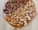 A picture of step 11 of Mixed nuts chikki pizza (chizza).