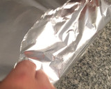 Foto del paso 7 de la receta: Trucha rellena de jamón y piñones