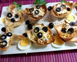 Foto del paso 4 de la receta: Cestitas de pan de molde rellenas de ensaladilla